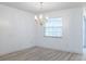 Dining room with window and decorative vintage chandelier at 828 Ne 51St Ave, Ocala, FL 34470