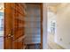 Pantry with wire shelves and view into the kitchen and living room at 828 Ne 51St Ave, Ocala, FL 34470