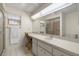 Bathroom featuring a long countertop, full mirror, and walk-in shower at 8712 Sw 92Nd Pl # D, Ocala, FL 34481