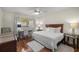 Bedroom with a ceiling fan, desk, and a large window at 8712 Sw 92Nd Pl # D, Ocala, FL 34481