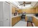 Well-lit kitchen featuring stainless steel appliances, and ample storage space at 8712 Sw 92Nd Pl # D, Ocala, FL 34481