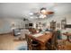Spacious living and dining area showcasing hardwood floors, decorative accents, and ample seating space at 8712 Sw 92Nd Pl # D, Ocala, FL 34481