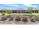 Well-maintained backyard with a screened lanai and lush landscaping, perfect for outdoor entertaining and relaxation at 8820 Sw 104Th Cir, Ocala, FL 34481