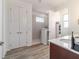 Bathroom featuring a walk-in shower and double door closet at 8820 Sw 104Th Cir, Ocala, FL 34481