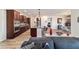 Living room view showing a large and modern kitchen at 8820 Sw 104Th Cir, Ocala, FL 34481
