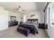 The main bedroom features neutral tones and a ceiling fan at 8820 Sw 104Th Cir, Ocala, FL 34481