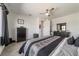 The main bedroom features a ceiling fan and an open closet at 8820 Sw 104Th Cir, Ocala, FL 34481