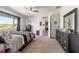 The main bedroom is spacious with a ceiling fan and neutral decor at 8820 Sw 104Th Cir, Ocala, FL 34481