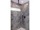 Bathroom featuring a luxurious shower with a unique rain shower head and modern fixtures at 8878 Sw 133Rd Lane Rd, Ocala, FL 34473