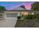 Charming single story home boasts mature landscaping and a clean, white painted brick exterior at 9015 Sw 94Th St # D, Ocala, FL 34481