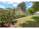 Lush backyard with well-maintained landscaping and mature trees providing shade and privacy at 9015 Sw 94Th St # D, Ocala, FL 34481