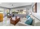 Comfortable living room with a cozy seating arrangement and bright natural light at 9015 Sw 94Th St # D, Ocala, FL 34481