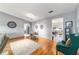 Bright living space with wood floors, wet bar, and an open layout to dining area perfect for modern living at 9015 Sw 94Th St # D, Ocala, FL 34481