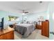 Tranquil main bedroom provides generous space, natural light, and neutral decor at 9015 Sw 94Th St # D, Ocala, FL 34481