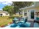 Charming backyard patio with outdoor seating, and access to the lush green lawn at 9015 Sw 94Th St # D, Ocala, FL 34481