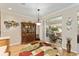 Dining area with wooden cabinet and sliding glass doors leading to the patio at 9290 Se 120Th Loop, Summerfield, FL 34491