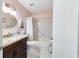 Cozy bathroom featuring granite countertops, bathtub with shower, and tile floors at 9331 Sw 84Th Ter # C, Ocala, FL 34481