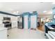 Well-lit kitchen with stainless steel appliances and seamless flow to living areas at 9331 Sw 84Th Ter # C, Ocala, FL 34481