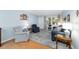 Welcoming living room with hardwood floors and bright blue walls at 9331 Sw 84Th Ter # C, Ocala, FL 34481