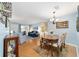 Inviting living room showcasing a comfortable blue sofa and warm hardwood floors at 9331 Sw 84Th Ter # C, Ocala, FL 34481