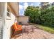 Outdoor patio with brick pavers, seating, and a grill, perfect for entertaining at 9331 Sw 84Th Ter # C, Ocala, FL 34481