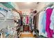 Organized walk-in closet featuring shelving and hanging space for ample storage solutions at 9331 Sw 84Th Ter # C, Ocala, FL 34481