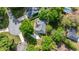Beautiful aerial view of a home with mature trees and lush landscaping at 9579 Sw 195 Cir, Dunnellon, FL 34432