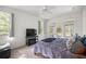 Relaxing bedroom with natural light and access to the outdoors at 9579 Sw 195 Cir, Dunnellon, FL 34432
