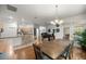 Open concept kitchen and dining area features lots of sunlight and neutral tones at 9579 Sw 195 Cir, Dunnellon, FL 34432