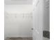 An efficient walk-in closet with a wire shelf and laminate floor at 9709 Sw 40Th Ct, Ocala, FL 34476
