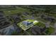 Aerial view of the house in a residential neighborhood, showcasing the backyard and surrounding community at 9957 Sw 55Th Avenue Rd, Ocala, FL 34476