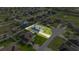 Birds-eye view of the house with fenced yard, surrounded by other homes in a well-maintained neighborhood at 9957 Sw 55Th Avenue Rd, Ocala, FL 34476