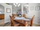 Formal dining room featuring an open floor plan and decorative wall accents at 9957 Sw 55Th Avenue Rd, Ocala, FL 34476