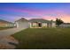 Charming single-story home with well-maintained lawn, neutral colors, and attached two-car garage at 9957 Sw 55Th Avenue Rd, Ocala, FL 34476
