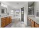 Bright main bathroom with double vanities, soaking tub, and tiled shower at 9957 Sw 55Th Avenue Rd, Ocala, FL 34476