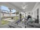 Screened in porch with comfortable seating and outdoor views at 9957 Sw 55Th Avenue Rd, Ocala, FL 34476