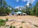 New construction home featuring block construction, a covered entry, and large lot at 13131 Sw 52Nd Lane Rd, Ocala, FL 34481
