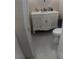 Bathroom featuring a vanity and toilet at 1858 Se Lake Weir Ave, Ocala, FL 34471