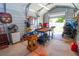 Interior view of a workshop with a variety of tools and equipment at 42 Larch Run, Ocala, FL 34480