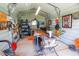 Interior view of a workshop with a table saw, tools, and other equipment at 42 Larch Run, Ocala, FL 34480