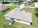 Aerial shot showcasing home's backyard and long driveway in a quiet neighborhood at 4998 Nw 30Th Pl, Ocala, FL 34482