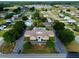 Overhead shot of a community clubhouse and pool in an attractive neighborhood at 4998 Nw 30Th Pl, Ocala, FL 34482