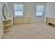 Spacious bedroom with carpet flooring and large windows allowing ample natural light at 4998 Nw 30Th Pl, Ocala, FL 34482