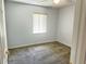 Bedroom featuring neutral walls, carpet flooring and a window offering natural light at 4998 Nw 30Th Pl, Ocala, FL 34482