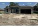 Charming single-story house featuring an attached two-car garage and neutral gray exterior at 5318 Sw 116Th Sw Pl, Ocala, FL 34476