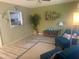 Cozy living room with a comfortable seating area and a pass-through to the kitchen at 9530 Sw 85Th Ave # B, Ocala, FL 34481