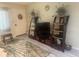 Well-lit living room with a large television and sleek entertainment center at 9530 Sw 85Th Ave # B, Ocala, FL 34481