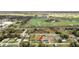 Picturesque home situated in a tranquil neighborhood with mature trees, near a golf course and green landscape at 1062 Nw 69Th St, Ocala, FL 34474