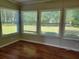 Light-filled sunroom offering a view of the yard at 11250 Sw 76Th Ave, Ocala, FL 34476