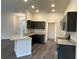 Well-equipped kitchen featuring granite countertops, stainless steel appliances, and modern fixtures at 12864 Sw 40 Ter, Ocala, FL 34473